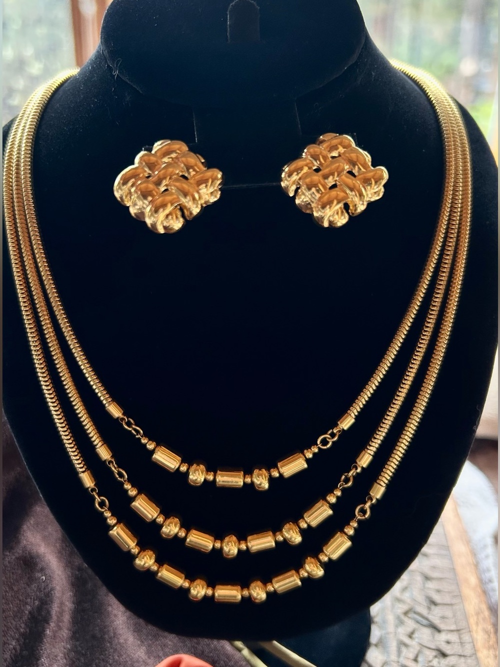 Monet Gold-Tone Triple Strand Necklace with Cylindrical Beads & Braided Earrings